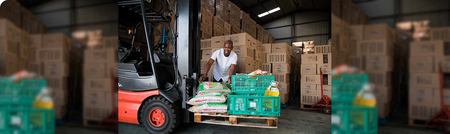 Food Forward storage warehouse and worker